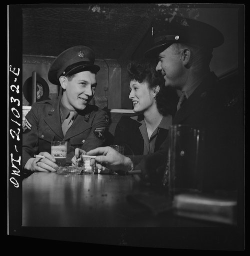 Washington, D.C. Girl who has picked up two soldiers since coming into the Sea Grill alone. They are drinking beer and exchanging life histories