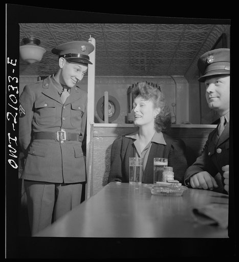 Washington, D.C. Soldier asking permission to sit at a booth at the Sea Grill