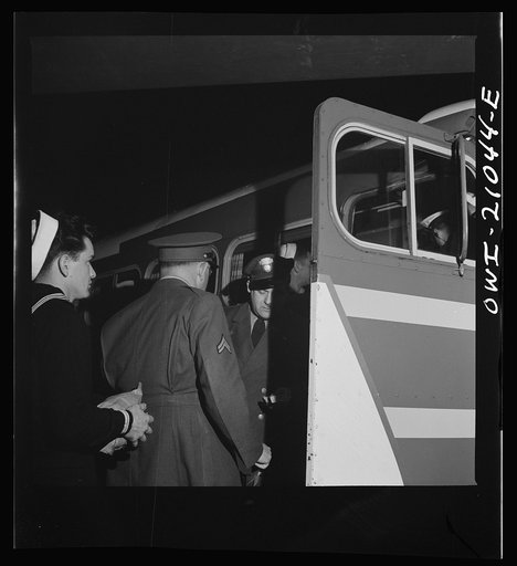 Washington, D.C. Boarding a special bus for servicemen. Leaving the Greyhound terminal on Sunday night