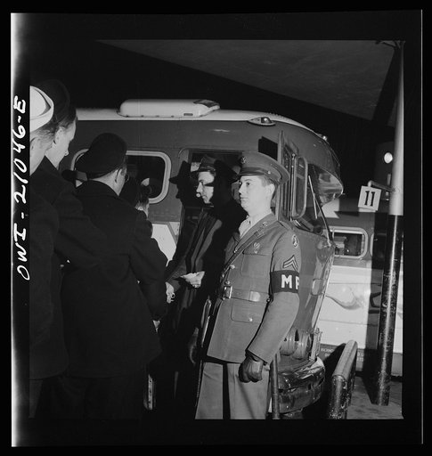 Washington, D.C. Boarding a special bus for servicemen. Leaving the Greyhound terminal on Sunday night