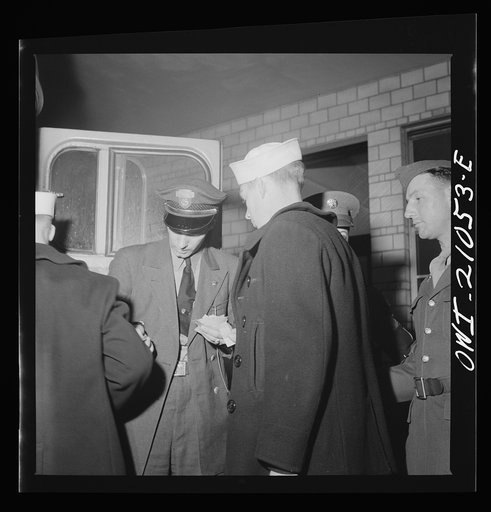 Washington, D.C. Boarding a special bus for servicemen. Leaving the Greyhound terminal on Sunday night