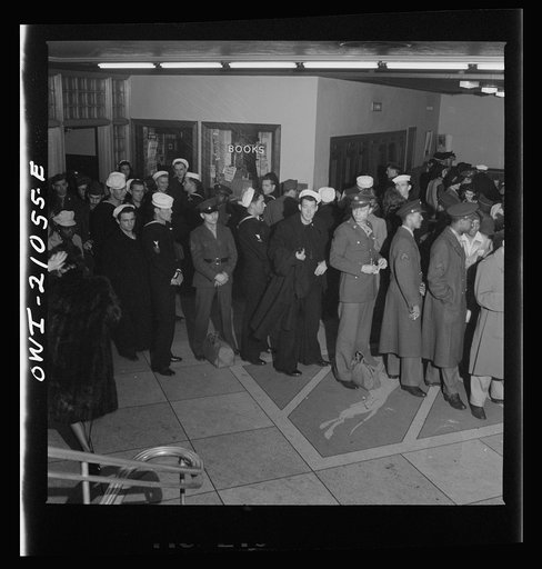 Untitled photo, possibly related to: Washington, D.C. Waiting in line to board a bus at the Greyhound terminal