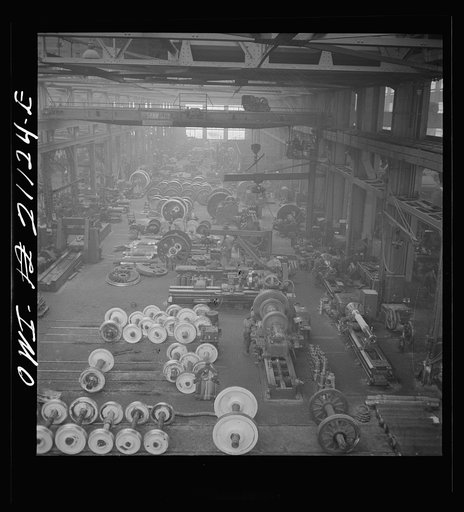 Untitled photo, possibly related to: Albuquerque, New Mexico. In the wheel shop of the Atchison, Topeka and Santa Fe Railroad shop