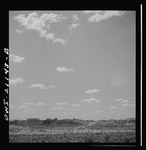 Laguna (vicinity), New Mexico. Indian adobe houses along the Atchison, Topeka and Santa Fe Railroad between Belen and Gallup, New Mexico