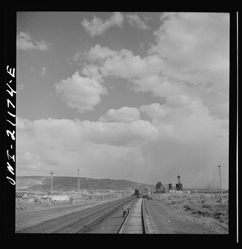 Grants, New Mexico. Going through the town on the Atchison, Topeka and Santa Fe Railroad between Belen and Gallup, New Mexico