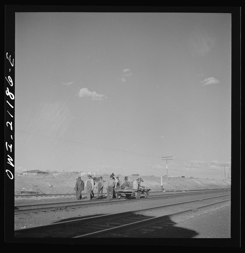 Thoreau, New Mexico. Section crew coming in after a day's work on the Atchison, Topeka and Santa Fe Railroad between Belen and Gallup, New Mexico