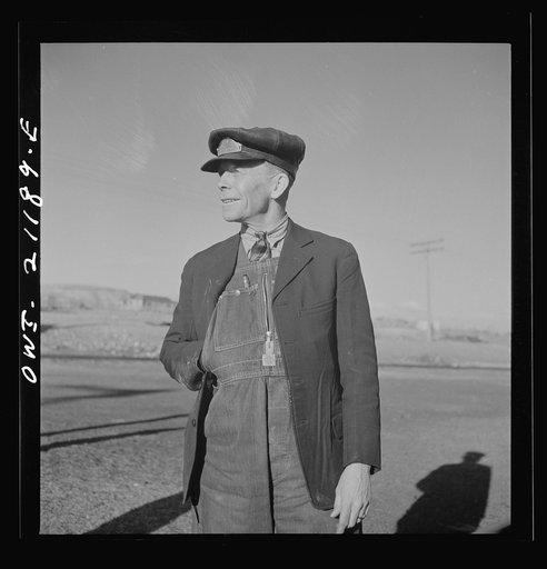 Untitled photo, possibly related to: Thoreau, New Mexico. Conductor C.W. Tevis, with the Atchison, Topeka and Santa Fe Railroad for thirty-two years
