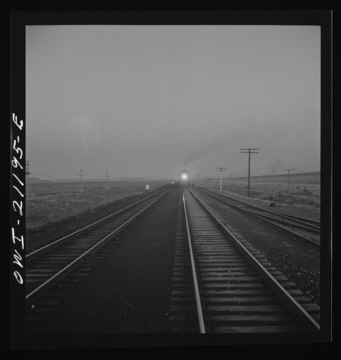 Gallup, New Mexico. A train on the Atchison, Topeka and Santa Fe Railroad between Belen and Gallup, New Mexico