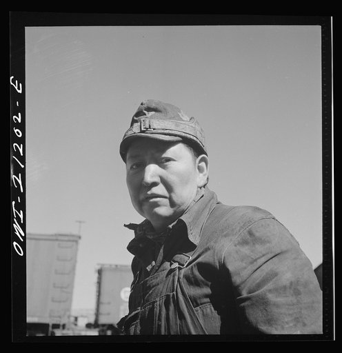 Untitled photo, possibly related to: Gallup, New Mexico. Ben Acory, an Indian worker employed at the Atchison, Topeka and Santa Fe Railroad car shops