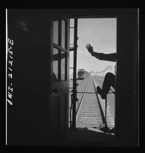 Havre, Arizona. Passing an eastbound freight train along the Atchison, Topeka and Santa Fe Railroad between Gallup, New Mexico and Winslow, Arizona