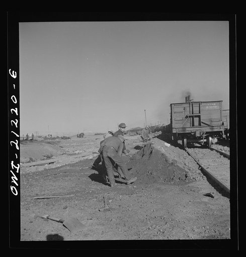 Untitled photo, possibly related to: Winslow, Arizona. Indian laborers at work in the Atchison, Topeka and Santa Fe Railroad yard