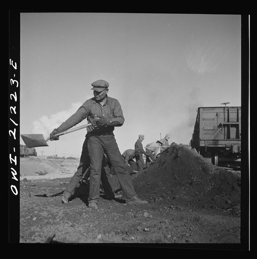 Winslow, Arizona. Indian laborers at work in the Atchison, Topeka and Santa Fe Railroad yard