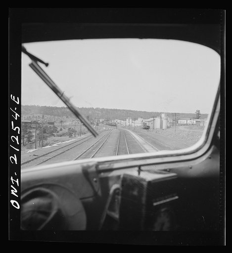Untitled photo, possibly related to: Flagstaff, Arizona. Entering the town along the Atchison, Topeka, and Santa Fe Railroad between Winslow and Seligman, Arizona