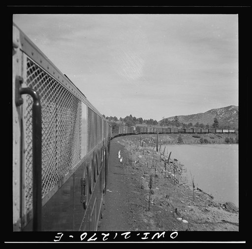 Williams, Arizona. On the Atchison, Topeka, and Santa Fe Railroad between Winslow and Seligman, Arizona, going around a curve in the mountains