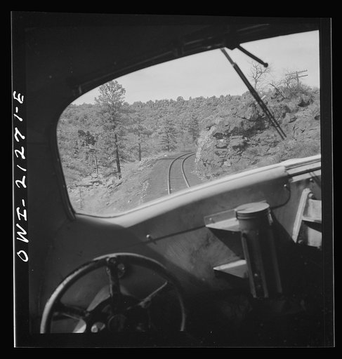 Untitled photo, possibly related to: Williams, Arizona. On the Atchison, Topeka and Santa Fe Railroad between Winslow and Seligman, Arizona, going around a curve in the mountains