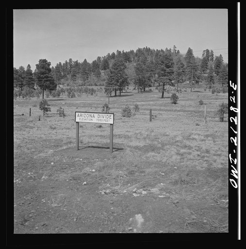 Williams (vicinity), Arizona. A sign marking the Arizona divide along the Atchison, Topeka and Santa Fe Railroad between Winslow and Seligman, Arizona