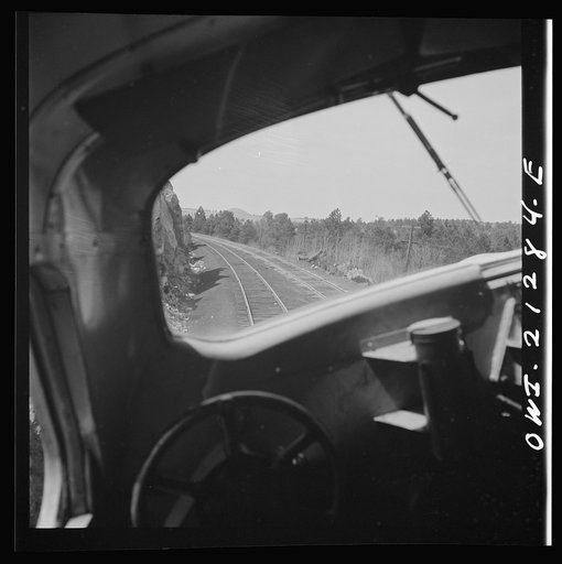 Untitled photo, possibly related to: Williams, Arizona. On the Atchison, Topeka and Santa Fe Railroad between Winslow and Seligman, Arizona, going around a curve in the mountains