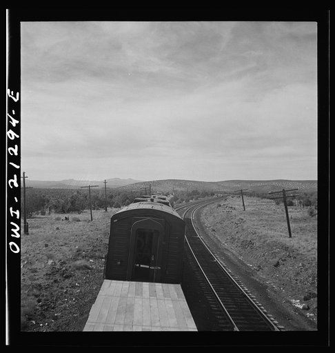 Untitled photo, possibly related to: Diesel freight train on the Atchison, Topeka and Santa Fe Railroad between Winslow and Seligman, Arizona going down the mountain from Supai to Ash Fork, Arizona, a drop of about 1600 feet