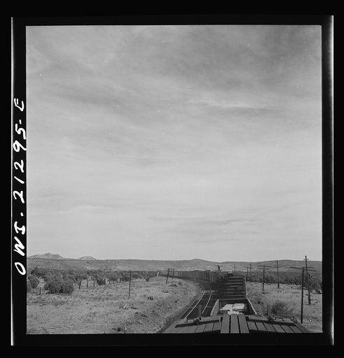 Untitled photo, possibly related to: Diesel freight train on the Atchison, Topeka and Santa Fe Railroad between Winslow and Seligman, Arizona going down the mountain from Supai to Ash Fork, Arizona, a drop of about 1600 feet
