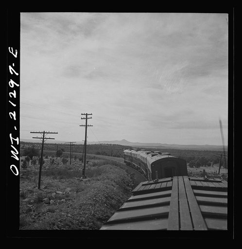 Untitled photo, possibly related to: Diesel freight train on the Atchison, Topeka and Santa Fe Railroad between Winslow and Seligman, Arizona going down the mountain from Supai to Ash Fork, Arizona, a drop of about 1600 feet