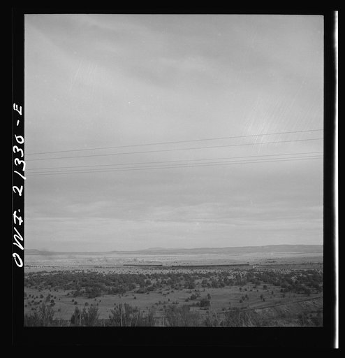 Gleed (vicinity), Arizona. East and westbound trains passing on the Atchison, Topeka and Santa Fe Railroad between Winslow and Seligman, Arizona
