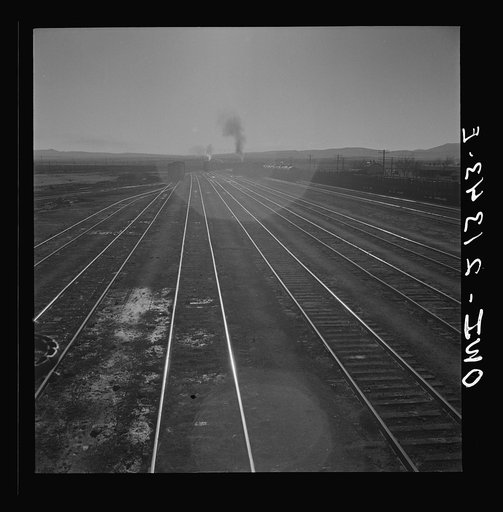 Untitled photo, possibly related to: Seligman, Arizona. Leaving the Atchison, Topeka, and Santa Fe Railroad yard between Seligman, Arizona and Needles, California