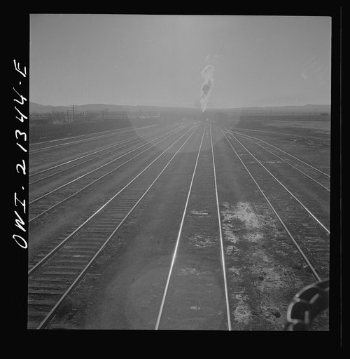 Untitled photo, possibly related to: Seligman, Arizona. Leaving the Atchison, Topeka, and Santa Fe Railroad yard between Seligman, Arizona and Needles, California