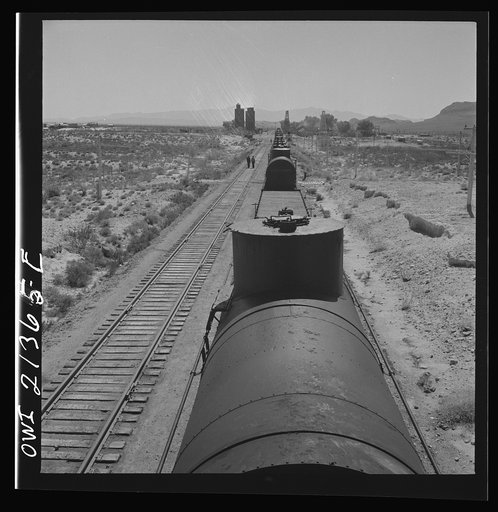 Yucca, Arizona. A local Atchison, Topeka and Santa Fe Railroad train stopping to set out a car