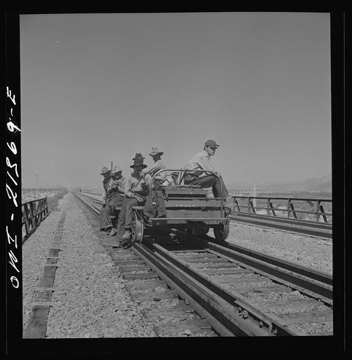 Untitled photo, possibly related to: Yucca, Arizona. A section crew returning from work on the Atchison, Topeka and Santa Fe Railroad between Seligman, Arizona and Needles, California