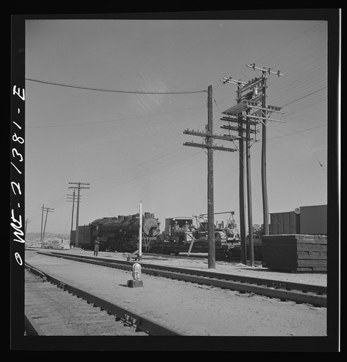 Topock, Arizona. The engine of a local freight train on the Atchison, Topeka and Santa Fe Railroad between Seligman, Arizona and Needles, California setting out cars
