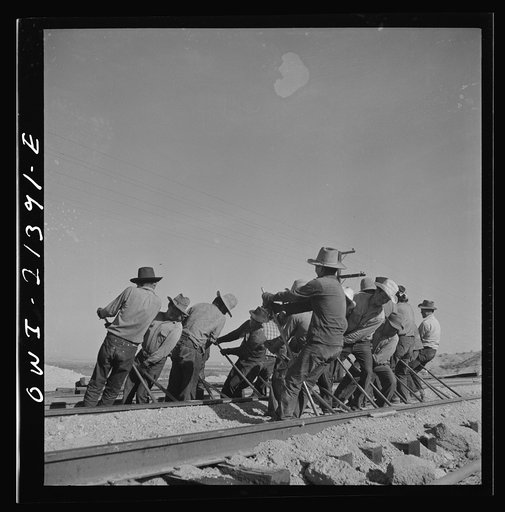 Needles, California. An Indian section gang at work on the tracks in the Atchison, Topeka and Santa Fe Railroad yards