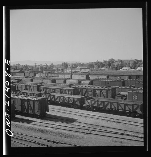 Untitled photo, possibly related to: Needles, California. A general view of the Atchison, Topeka, and Santa Fe Railroad yards