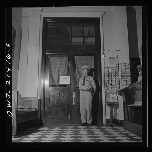 Needles, California. Due to the inability to handle the great crowds on the trains, and because of the labor shortage, the restaurant of the Harvey House at the Atchison, Topeka, and Santa Fe Railroad yard serves only railroad employees