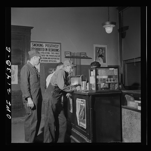 Barstow, California. Brakeman, Charles M. Dawes, registering at the reading room in the Atchison, Topeka, and Santa Fe Railroad yard