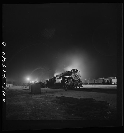 Barstow, California. A view of the Atchison, Topeka and Santa Fe Railroad yard at night