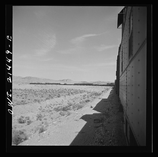 Klondike (vicinity), California. Going around a curve on the Atchison, Topeka and Santa Fe Railroad between Needles and Barstow, California