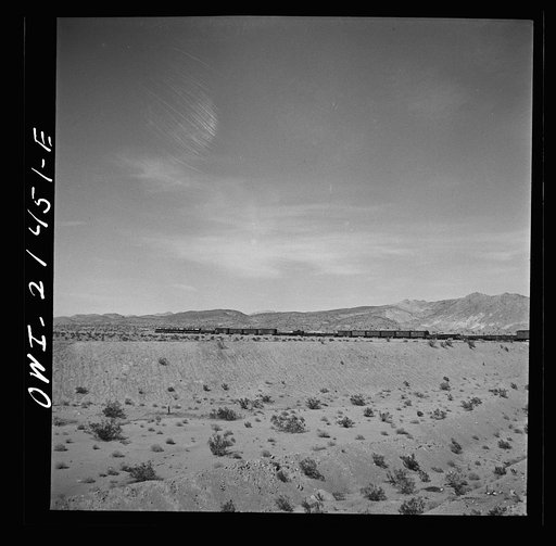 Klondike (vicinity), California. Going around a curve on the Atchison, Topeka and Santa Fe Railroad between Needles and Barstow, California