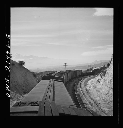 Untitled photo, possibly related to: Summit (vicinity), California. Going down the mountains on the Atchison, Topeka, and Santa Fe Railroad between Barstow and San Bernardino, California