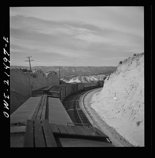 Summit (vicinity), California. Going down the mountains on the Atchison, Topeka, and Santa Fe Railroad between Barstow and San Bernardino, California