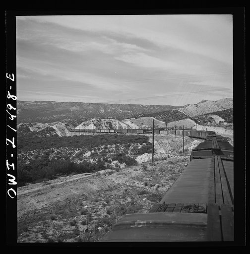 Summit (vicinity), California. Going down the mountains on the Atchison, Topeka, and Santa Fe Railroad between Barstow and San Bernardino, California