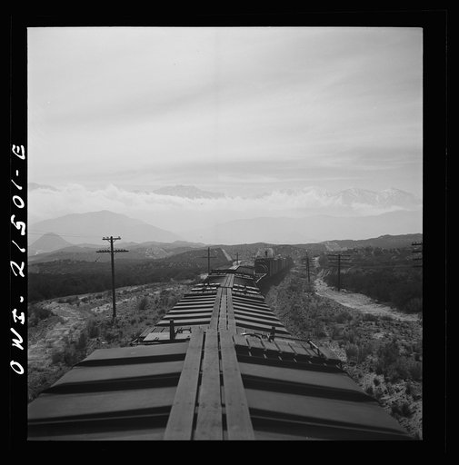 Summit (vicinity), California. Going down the mountains on the Atchison, Topeka, and Santa Fe Railroad between Barstow and San Bernardino, California