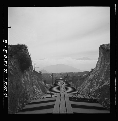 Summit (vicinity), California. Going down the mountains on the Atchison, Topeka, and Santa Fe Railroad between Barstow and San Bernardino, California