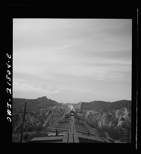 Summit (vicinity), California. Going down the mountains on the Atchison, Topeka, and Santa Fe Railroad between Barstow and San Bernardino, California