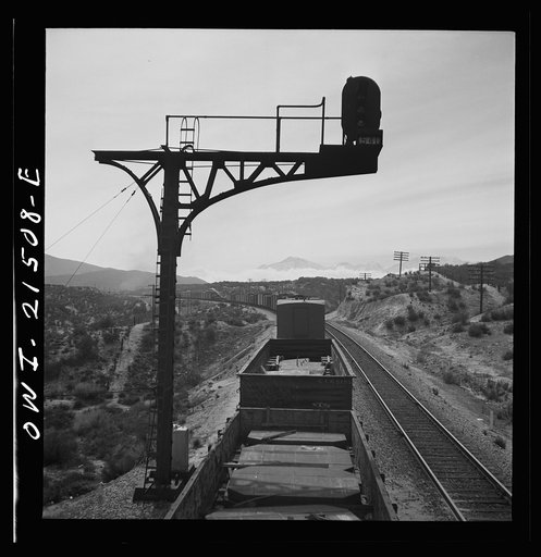 Summit (vicinity), California. Going down the mountains on the Atchison, Topeka, and Santa Fe Railroad between Barstow and San Bernardino, California