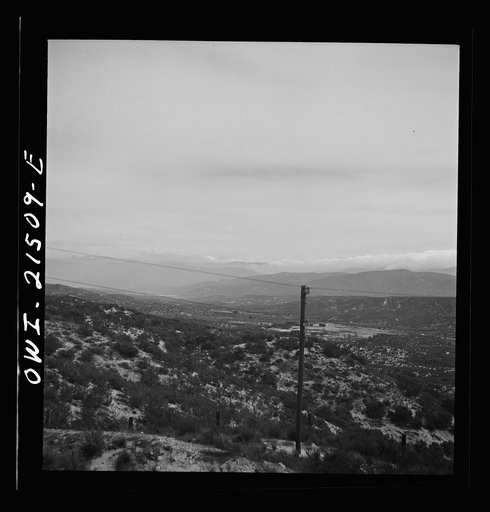 Summit (vicinity), California. Going down the mountains on the Atchison, Topeka, and Santa Fe Railroad between Barstow and San Bernardino, California