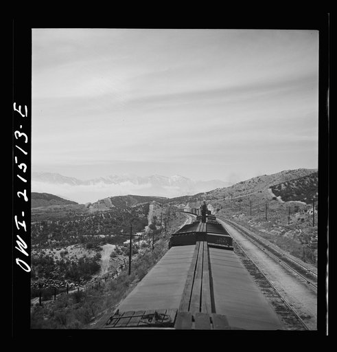 Untitled photo, possibly related to: Summit (vicinity), California. Going down the mountains on the Atchison, Topeka, and Santa Fe Railroad between Barstow and San Bernardino, California