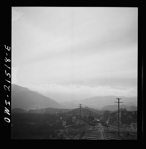 Untitled photo, possibly related to: Summit (vicinity), California. Going down the mountains on the Atchison, Topeka, and Santa Fe Railroad between Barstow and San Bernardino, California