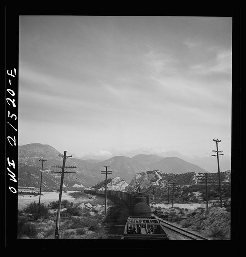 Untitled photo, possibly related to: Summit (vicinity), California. Going down the mountains on the Atchison, Topeka, and Santa Fe Railroad between Barstow and San Bernardino, California