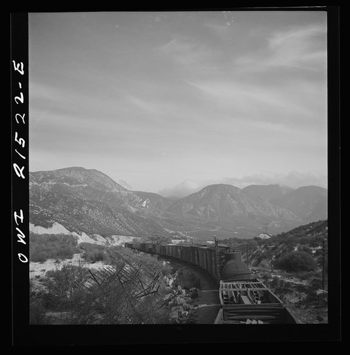 Summit (vicinity), California. Going down the mountains on the Atchison, Topeka, and Santa Fe Railroad between Barstow and San Bernardino, California