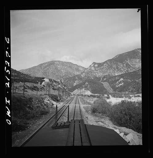 Untitled photo, possibly related to: Summit (vicinity), California. Going down the mountains on the Atchison, Topeka, and Santa Fe Railroad between Barstow and San Bernardino, California